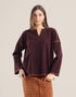 Sweater with round neckline with slits